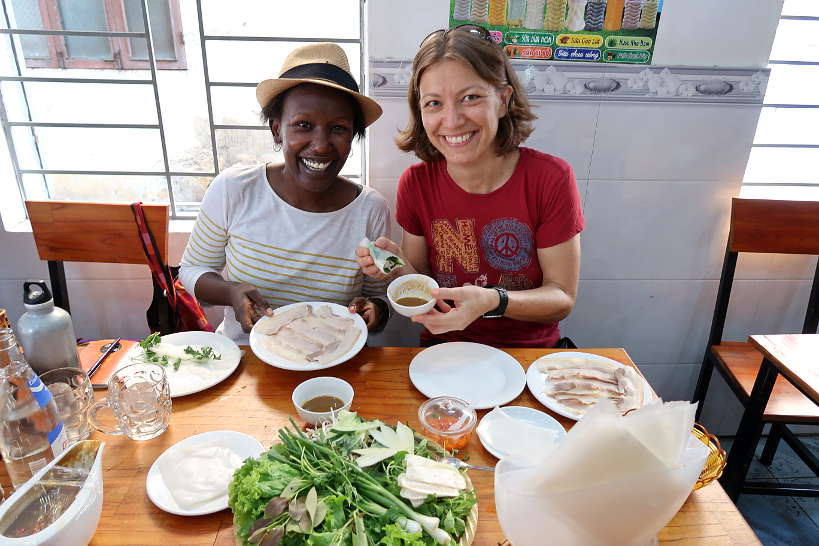 Rosemary and Claire eating Banh Trang Cuon Thit Heo a Danang Food by AuthenticFoodQuest