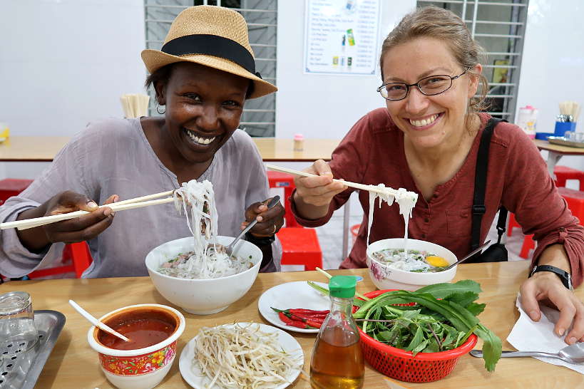 Rosemary and Claire eating Pho in Danang Vietnam by Authentic Food Quest