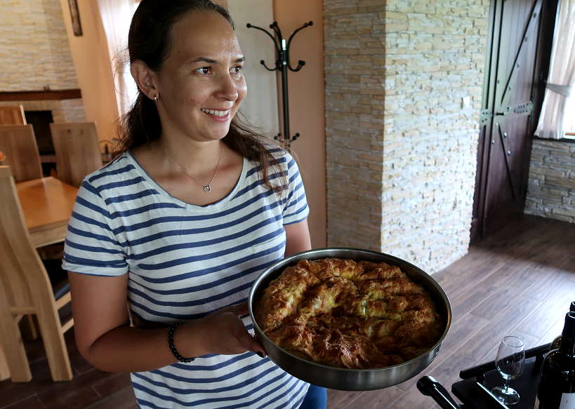 Anita Serving Banitza at Rupel Winery in Melnik Bulgaria by Authentic Food Quest