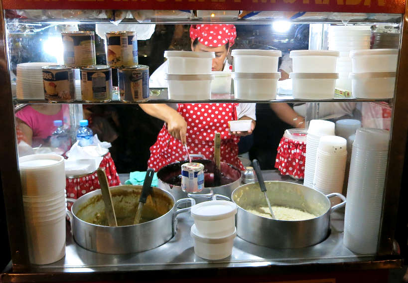 Vendors selling Arroz con Leche Peruvian desserts by Authentic Food Quest