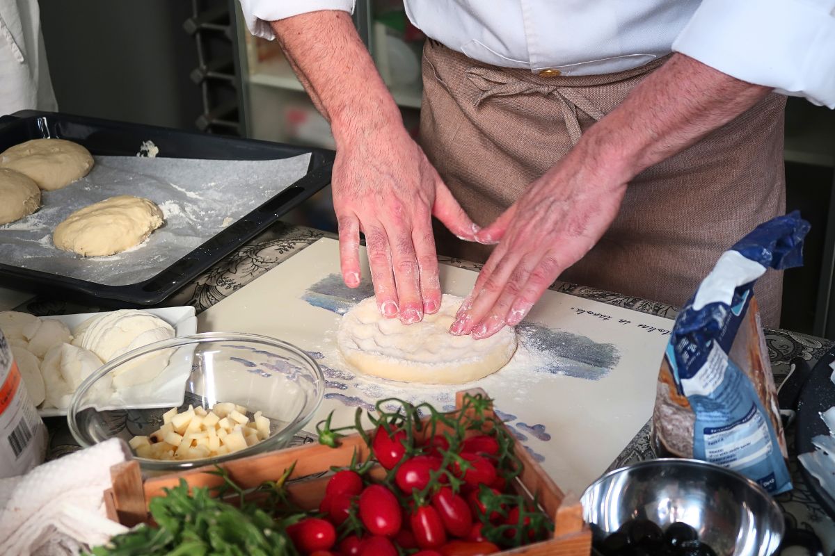 The art of Catanese tradition: chef kneads dough made from ancient Sicilian grains for a'Lava to Table' culinary workshop